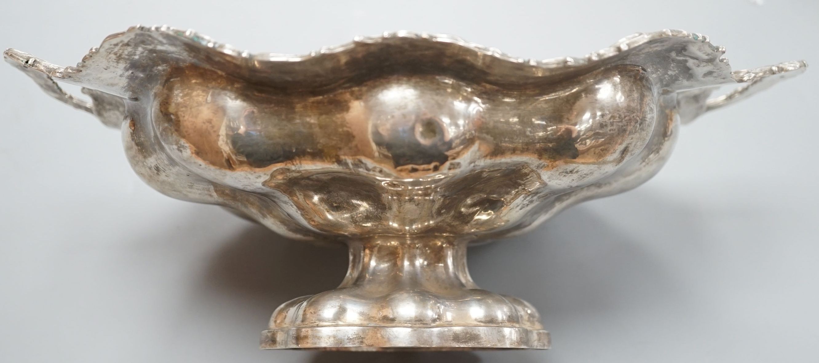 A 19th century Russian 84 zolotnik embossed tow handled fruit bowl, assay master, Dmitri Tvyersko?, 1846, master G.F.R., width, 30.2cm, 12oz.